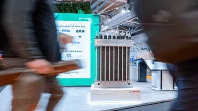 A Bosch trade fair booth showcasing hydrogen technologies.